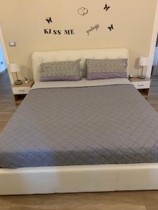 Postel nebo postele na pokoji v ubytování B&B Piano Romano -con parcheggio privato gratuito-