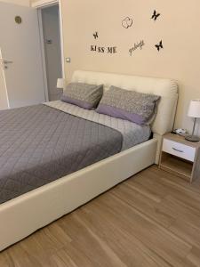 Postel nebo postele na pokoji v ubytování B&B Piano Romano -con parcheggio privato gratuito-