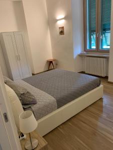Postel nebo postele na pokoji v ubytování B&B Piano Romano -con parcheggio privato gratuito-
