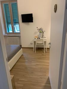 TV a/nebo společenská místnost v ubytování B&B Piano Romano -con parcheggio privato gratuito-