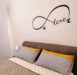 Postel nebo postele na pokoji v ubytování B&B Piano Romano -con parcheggio privato gratuito-