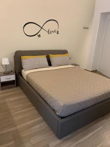 Postel nebo postele na pokoji v ubytování B&B Piano Romano -con parcheggio privato gratuito-