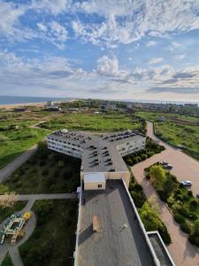 an aerial view of a building with a parking lot at Light room Затока in Zatoka