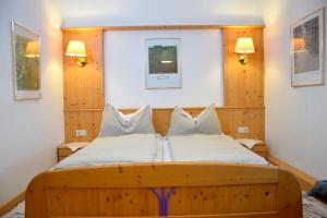 Uma cama ou camas num quarto em Rathskeller Weitra