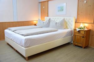 Uma cama ou camas num quarto em Rathskeller Weitra
