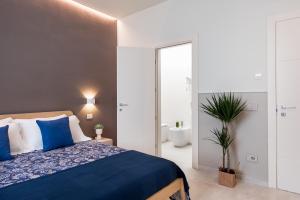 Posteľ alebo postele v izbe v ubytovaní Oltremare