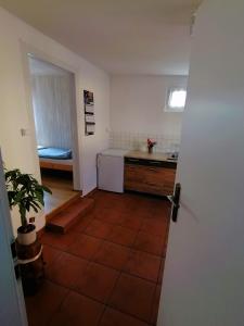 a kitchen with a sink and a counter top at Domek Stary Bar in Piecki +39 photos