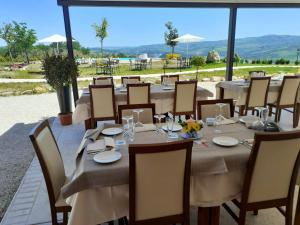 Restaurant ou autre lieu de restauration dans l'établissement Le Terre Del Sacramento