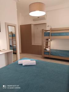 Postel nebo postele na pokoji v ubytování Hotel Maria