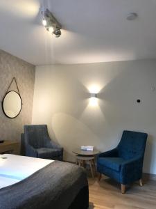 Postel nebo postele na pokoji v ubytování Flair Hotel zum Storchen