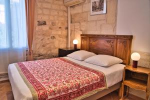 Postel nebo postele na pokoji v ubytování Hôtel La Muette