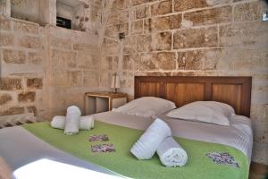 Postel nebo postele na pokoji v ubytování Hôtel La Muette