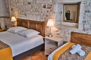 Postel nebo postele na pokoji v ubytování Hôtel La Muette