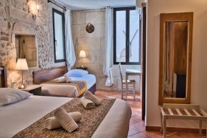 Postel nebo postele na pokoji v ubytování Hôtel La Muette