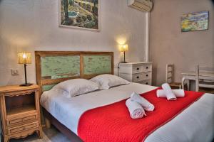Postel nebo postele na pokoji v ubytování Hôtel La Muette