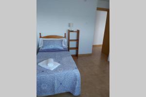 Postel nebo postele na pokoji v ubytování MAR Y SIERRA DE TORROX