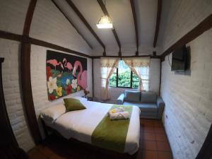 Letto o letti in una camera di Hostal Inti Luna