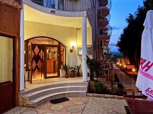 an entrance to a building with a large doorway at Hotel Margarita in Kranevo