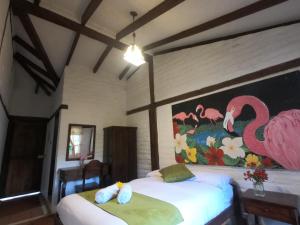 Letto o letti in una camera di Hostal Inti Luna