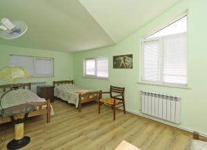 Fotografie z fotogalerie ubytování COMMUNE hotel v destinaci Garni + 37 fotografií