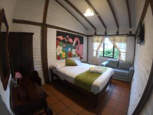 Letto o letti in una camera di Hostal Inti Luna