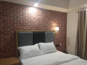 Postel nebo postele na pokoji v ubytování Shamrockmanor(TheResidence)