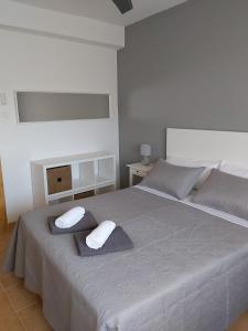 Postel nebo postele na pokoji v ubytování MAR Y SIERRA DE TORROX