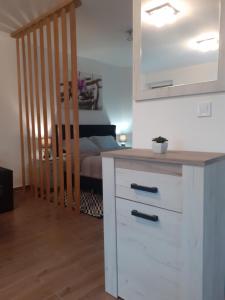 Kuchyňa alebo kuchynka v ubytovaní Rózsadomb apartman
