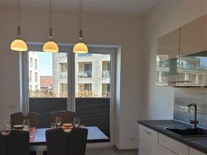 Kuchyň nebo kuchyňský kout v ubytování Apartment Quellblick, Am Alten Deich 4-6, Whg 6