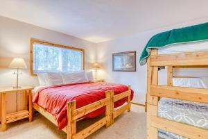 a bedroom with two bunk beds and a ladder at Mt Hood Chalet Vacation Rental in Government Camp