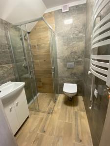 Kúpeľňa v ubytovaní Karolowy pokoje&apartamenty