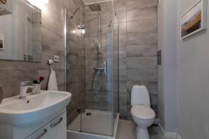 Kúpeľňa v ubytovaní TriApart Amber Jantar V + 30 fotografií