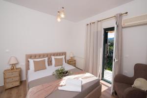Postel nebo postele na pokoji v ubytování Liovore Apartments