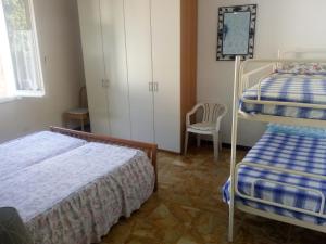 Postel nebo postele na pokoji v ubytování I Limoni di Matteo