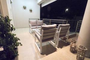 A seating area at Gianna's Villa Gialova