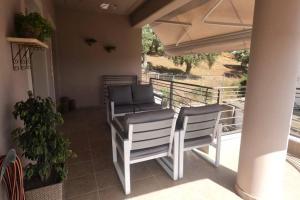 A balcony or terrace at Gianna's Villa Gialova