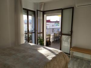 Posteľ alebo postele v izbe v ubytovaní Playa Escollera