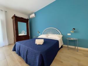 Ένα ή περισσότερα κρεβάτια σε δωμάτιο στο La Casaruccia