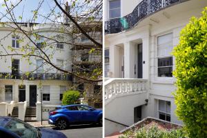 a blue car parked in front of a white building at Brunswick - Brighton Regency Studio by the sea in Brighton & Hove