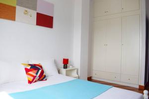 A bed or beds in a room at Magnificent sea view,clean and bright apartments