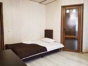 Letto o letti in una camera di Guest House Mountain