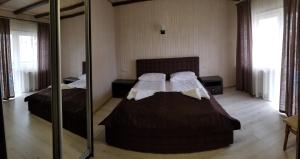 Letto o letti in una camera di Guest House Mountain