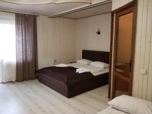 Letto o letti in una camera di Guest House Mountain