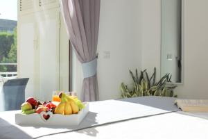 A bed or beds in a room at La Casa Degli Amici