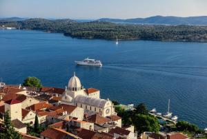 a cruise ship in a large body of water at N & D in Šibenik