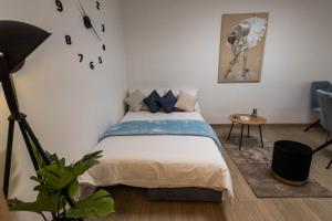 a bedroom with a bed in a room at N & D in Šibenik