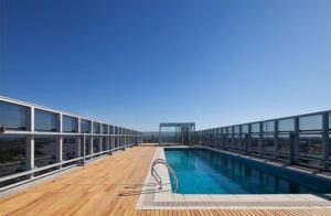 Bazén v ubytování Hotel UNL-ATE nebo v jeho okolí