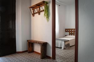 A bed or beds in a room at La Vaquería