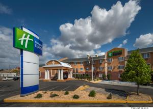 a hotel with a sign in front of a parking lot at Holiday Inn Express Winnemucca, an IHG Hotel in Winnemucca