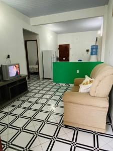 A seating area at Casa em Galinhos/RN